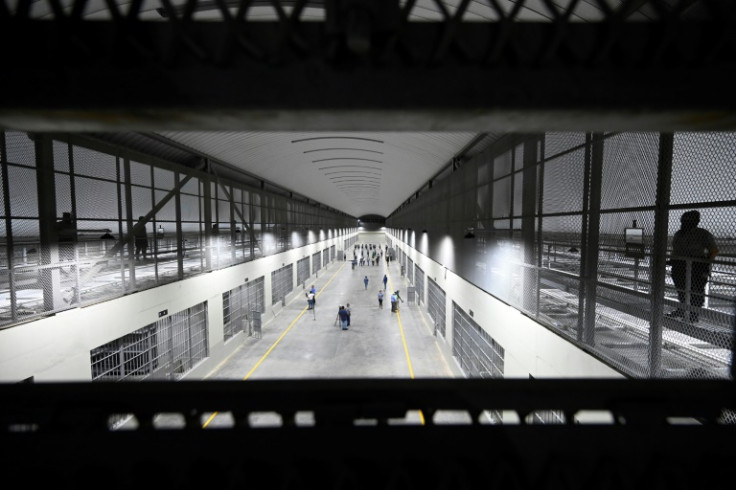 Guards prepare for the arrival of inmates at the new maxi-prison in Tecoluca, El Salvador, on February 2, 2023