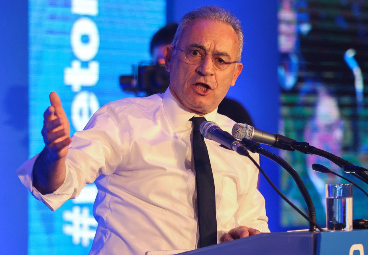 Cyprus presidential candidate Averof Neophytou, head of the governing right-wing Democratic Rally party, delivers a speech during a pre-election rally in Nicosia