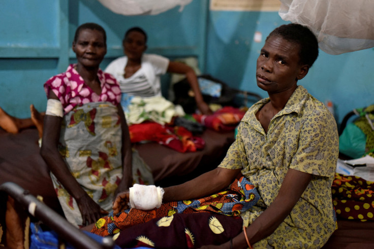 Congolese victims of ethnic violence rest inside a ward at the General Hospital in Bunia, Ituri province
