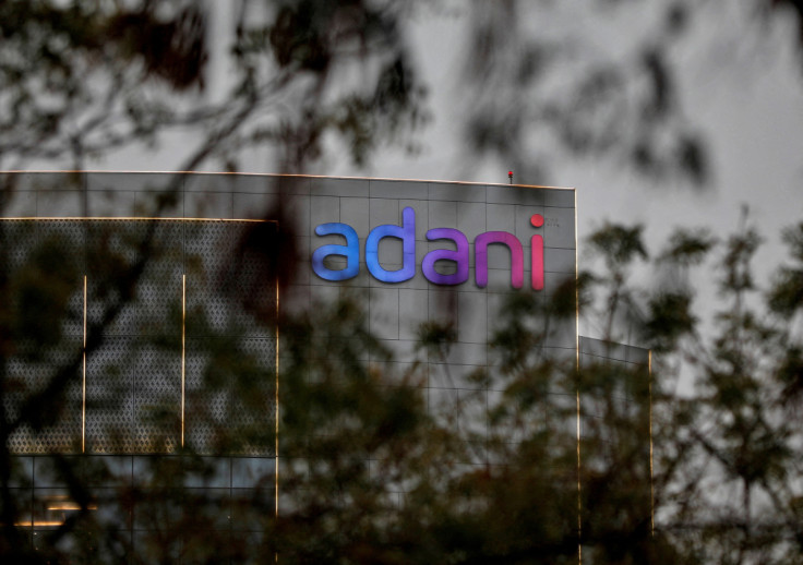 The logo of the Adani Group is seen on the facade of its Corporate House on the outskirts of Ahmedabad