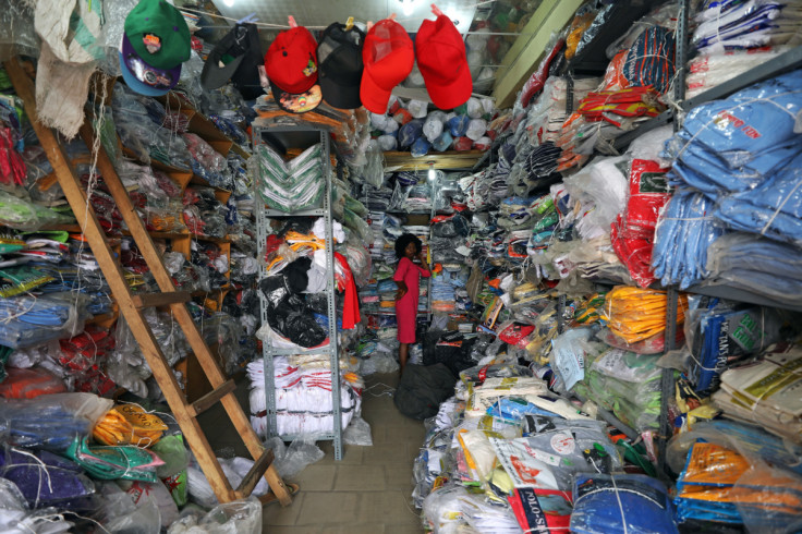 A woman stands inside a shop in Abuja