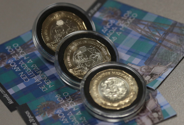 Three twenty pesos coins are seen, in this picture illustration