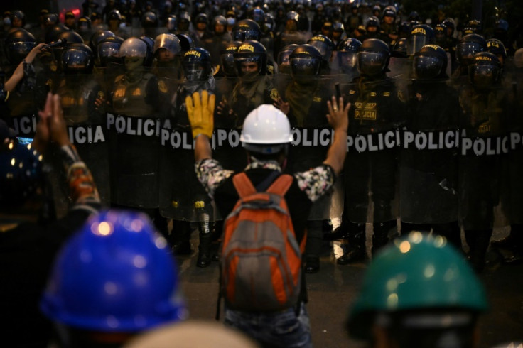 Protesters in Lima face off with police outside Congress, the body which demonstrators want to dissolve