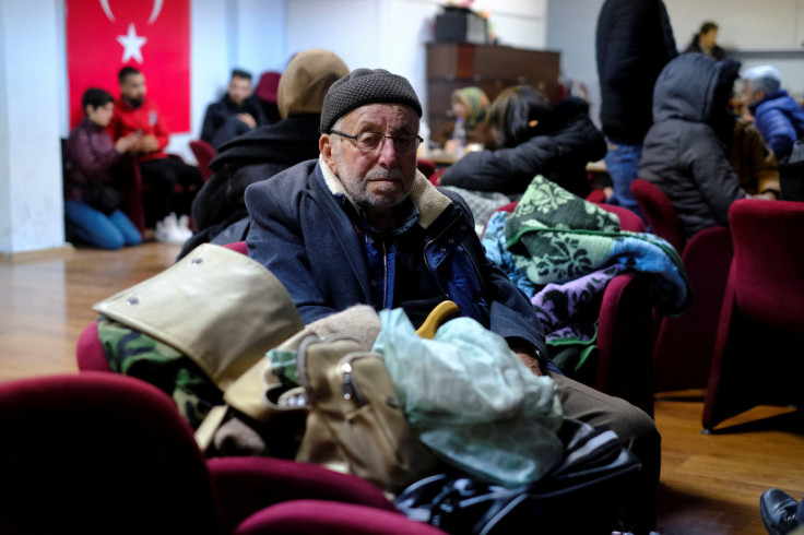 Koca Halil Budak sits in a school-turned-shelter in Adana, Turkey