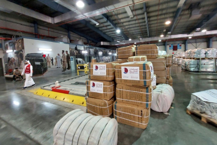 Humanitarian quake-relief aid awaits transport to Turkey at an airbase in Qatar February 7, 2023