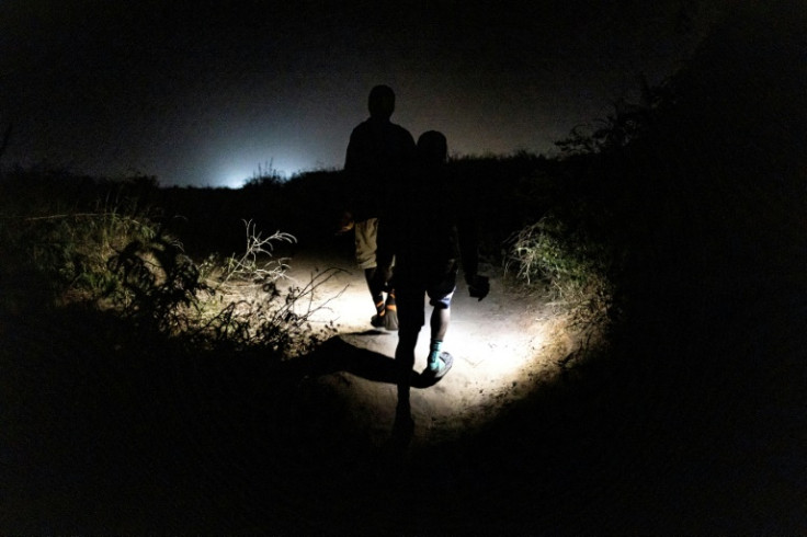 Construction workers from Sierra Leone pictured last November on their walk to work -- the trek took an hour and a half