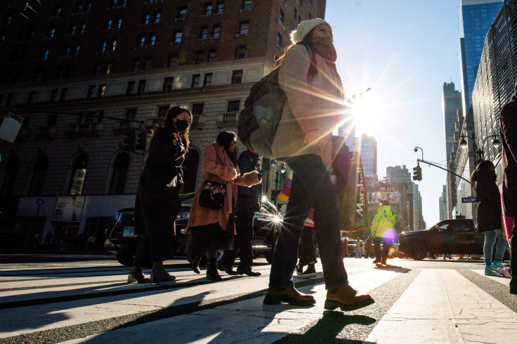A woman carries a shopping bag during the holiday season in New York