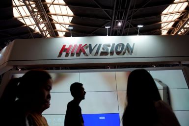 People visit a HIKVision booth at the security exhibition in Shanghai