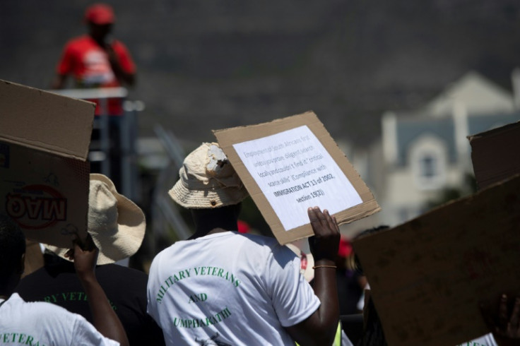 Protestors gathered outside Cape Town city hall ahead of the much-awaited speech