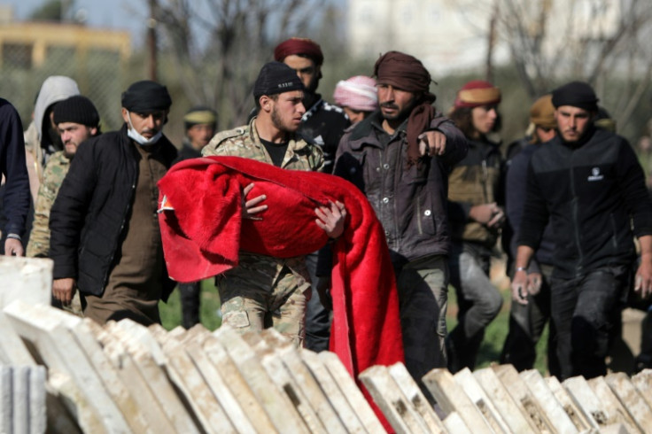 The death toll keeps climbing with bitter cold hampering the four-day search