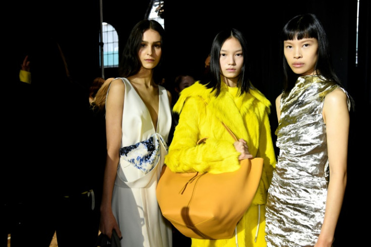 Models pose backstage at the Proenza Schouler show