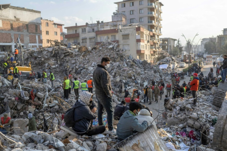 In many areas, rescue teams said they lacked sensors and advanced search equipment, leaving them to carefully dig through the rubble with shovels or only their hands