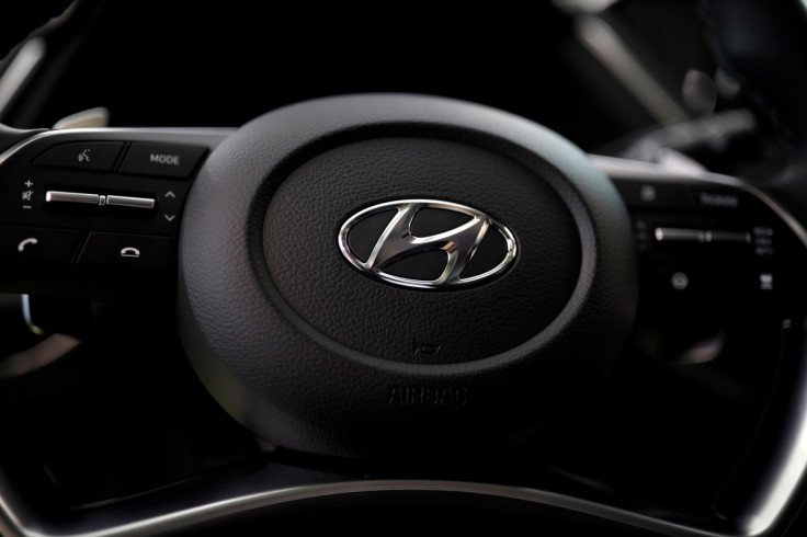 The logo of Hyundai Motors is seen on a steering wheel on display at the company's headquarters in Seoul
