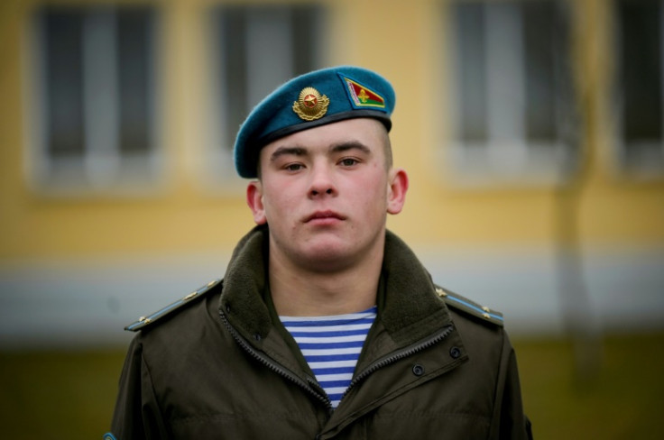 A paratrooper from the special forces models a military outfit worn by servicemen