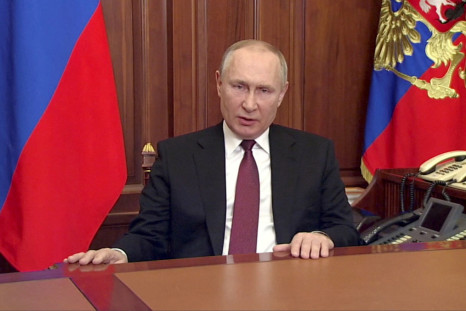 Russian President Vladimir Putin delivers a video address in Moscow