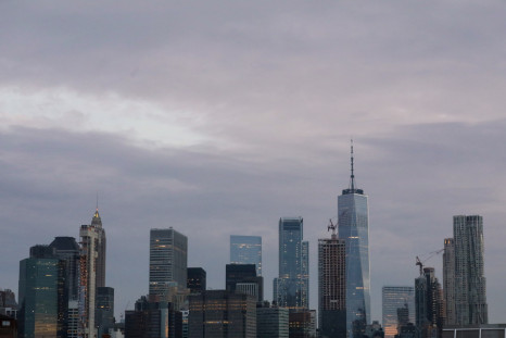 The skyline of lower Manhattan is seen before sunrise in New York