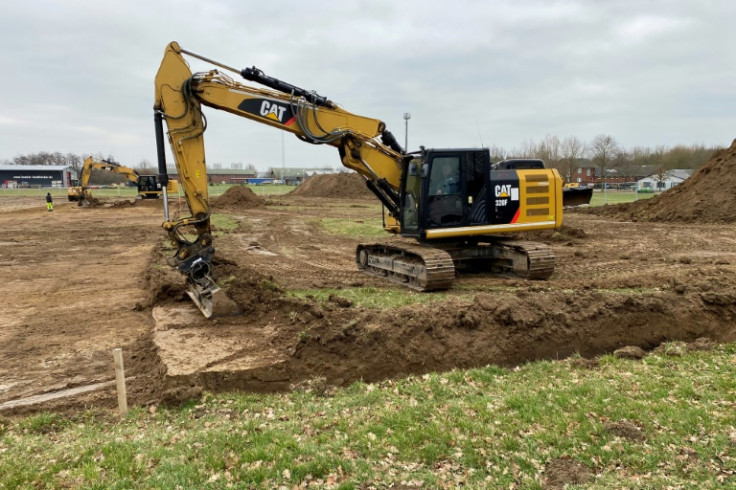 Diggers are clearing the ground for the new  refugee centre