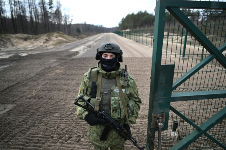 Belarusian guards in the village of Dzivin said they were on standby