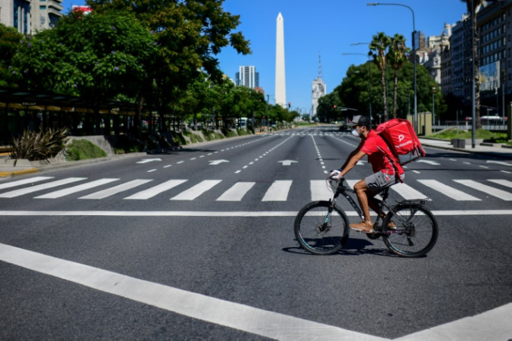 A food deliveryman rides a bicycle in Buenos Aires in March 2020
