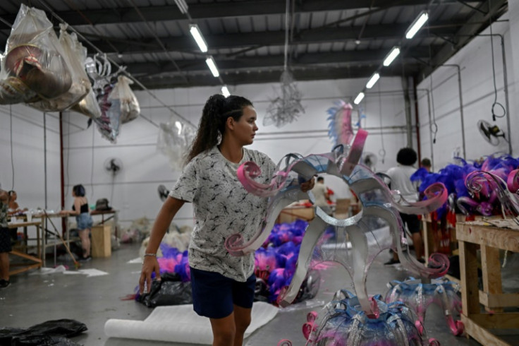 Rushing to finish costumes at the Viradouro samba school's hangar