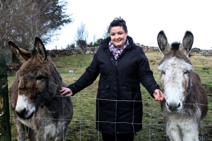 Madeline Condell, posing with her donkeys, was one of the extras from Achill Island who featured in the film