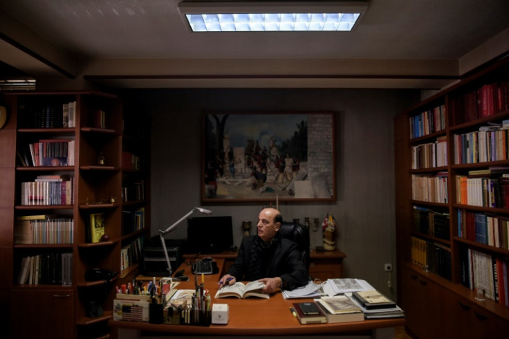 Shan Zefi, the Catholic vicar general of the diocese of Prizren-Pristina, in his office