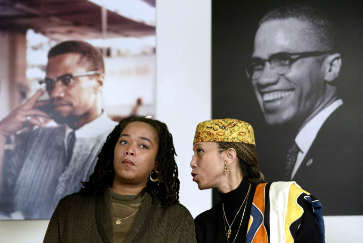 Attallah Shabazz (R) and Malaak Shabazz, two of the six daughters of the late Malcolm X  sit togethe..