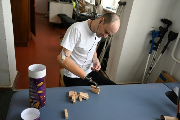 Ivan Lazar practises with his new prosthesis