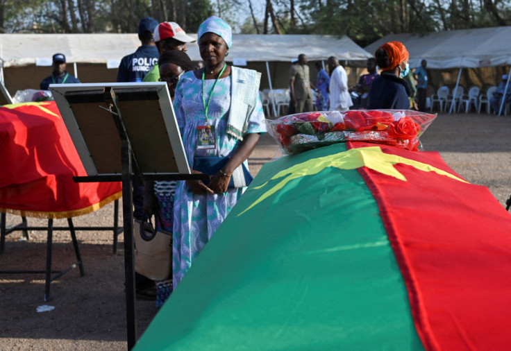 People pay respect to Thomas Sankara during burial ceremony in Ouagadougou