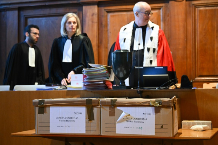 Presiding judge Francois Arnaud (R) did not give a new date Thursday for the delayed appeal hearing