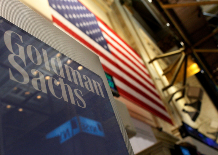 A Goldman Sachs sign is seen above their booth on the floor of the New York Stock Exchange