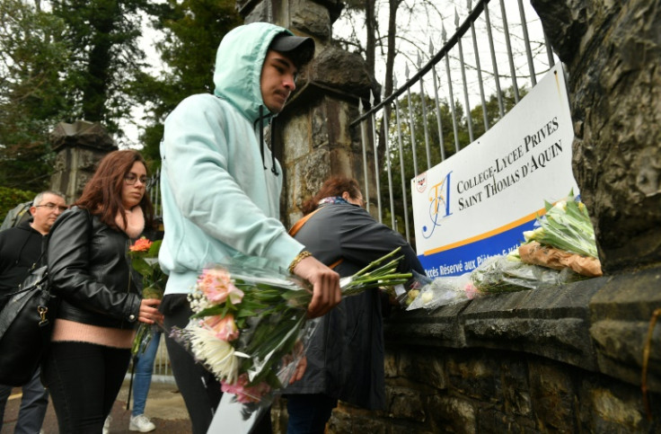 Schools across France held a minute of silence in the teacher's memory on Thursday