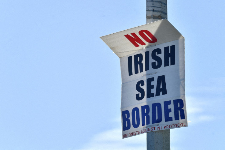 A poster reading "No Irish Sea border" is seen in the port of Larne, Northern Ireland