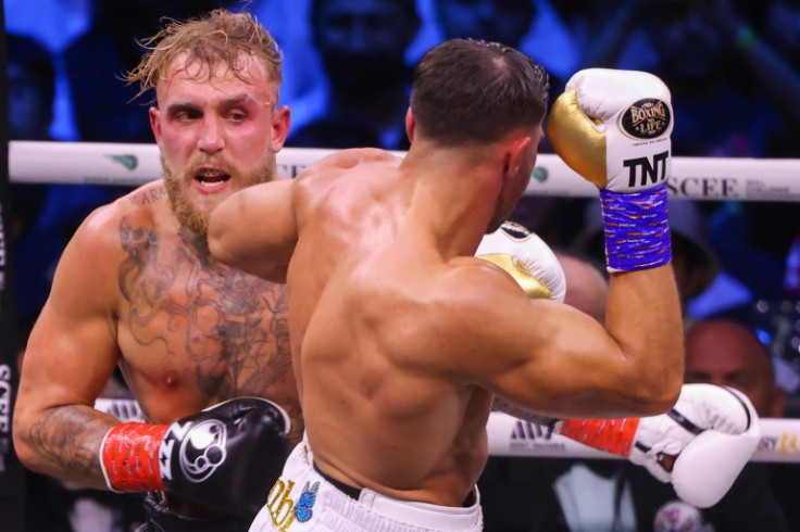 Jake Paul (left) was beaten on points by Tommy Fury (right)