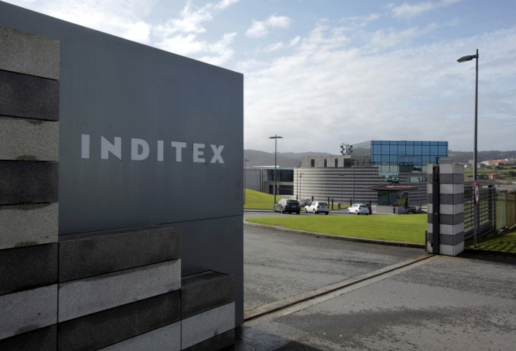 An Inditex logo is seen at the entrance of a Zara factory, the headquarters of Inditex group, in Arteixo