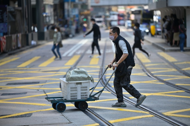 Hong Kong's three-year pandemic isolation and ticket of virus curbs battered the economy