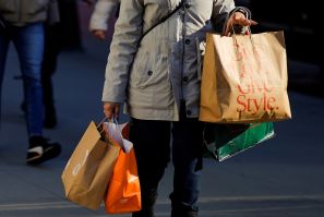 A woman carries shopping bags during the holiday season in New York
