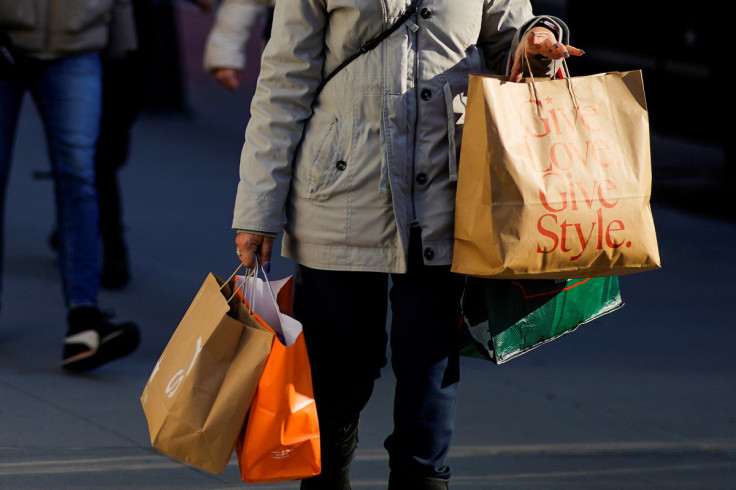 A woman carries shopping bags during the holiday season in New York