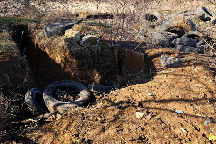 A trench is seen near a field of grain farmer Andrii Povod, amid Russia's invasion of Ukraine, in Bilozerka