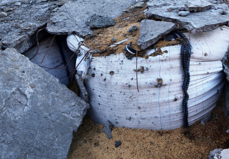 Debris lies on a sack of grain at the farm of Andrii Povod, amid Russia's invasion of Ukraine, in Bilozerka