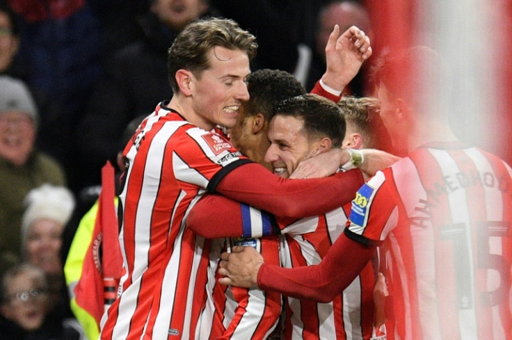 Sheffield United celebrate their goal against Tottenham in the FA Cup fifth round