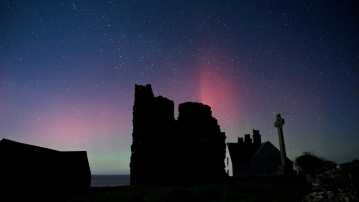 This picture by Ynys Enlli warden Emyr Owen shows the Aurora Borealis above buidlings on the tiny Welsh island