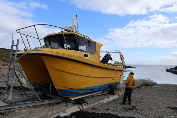 Ynys Enlli ferry operator Colin Evans is seeing business pick up -- but the island can only take so many tourists