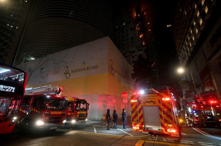 Firefighters respond to a fire at a high-rise under construction in Hong Kong's Tsim Sha Tsui neighbourhood