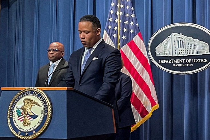 U.S. law enforcement officials announce international cryptocurrency enforcement action during news conference at the Justice Department in Washington