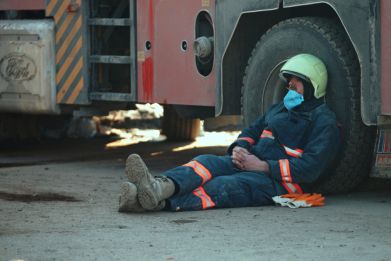 A rescue worker is seen at Trend Garden Residence, following a deadly earthquake, in Malatya