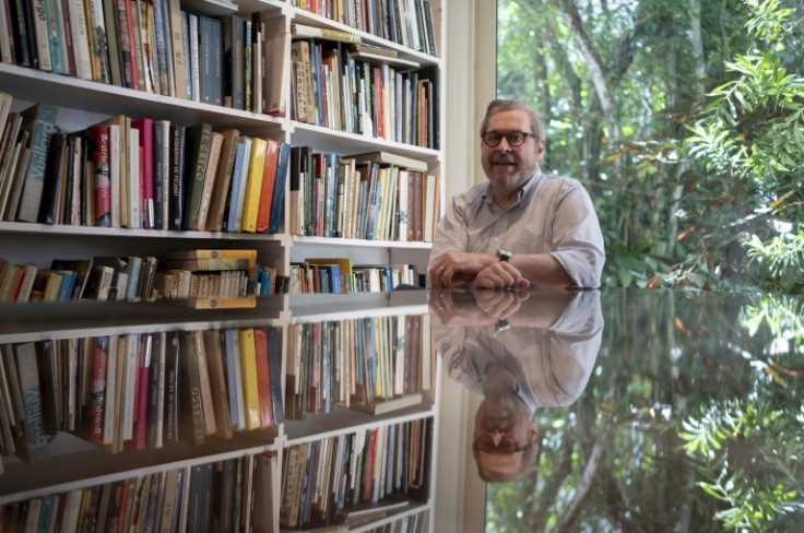 Brazilian art collector and writer Pedro Correa do Lago poses after an AFP interview at his house in Rio de Janeiro