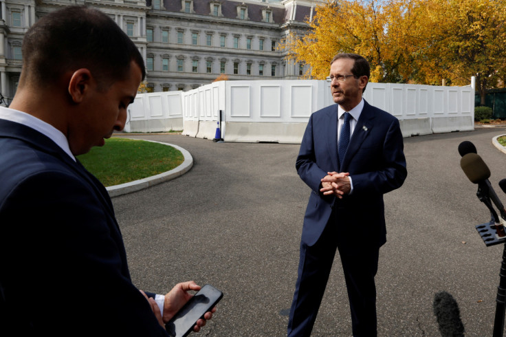 Israel’s President Herzog departs after speaking with reporters after meeting with U.S. President Biden at the White House in Washington