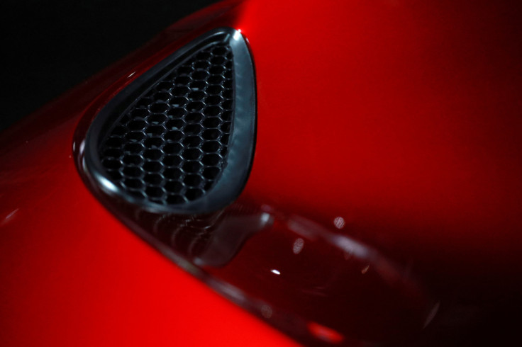 Car manufacturers display their wares on the show floor of the North American International Auto Show in Detroit