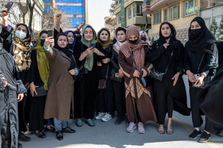 Women stage a rare protest on a Kabul street to mark International Women's Day, calling on the global community to protect Afghans. The United Nations called Afghanistan under the Taliban "the most repressive country in the world" for women's rights